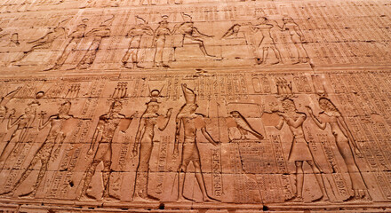 Wall art bas relief depicting Ptolemy V Epiphanes making offerings to Horus and Hathor in the...