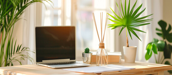 a desk laptop with aromatherapy diffuser