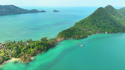 Breathtaking aerial vista of a pristine tropical sea paradise, an azure jewel beneath the sun's loving embrace. Travel and adventure concept. Ko Chang, Trat Province, Thailand. 
