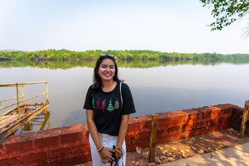 Smiling Young indian woman in Divar Island in Goa, india