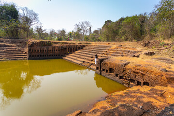 Restored pond with carved niches of 15 th century Sri Saptakoteshwar Temple built by Kadamba Kings...
