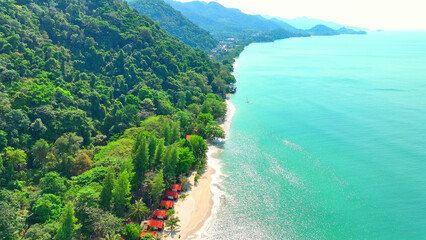 Azure sea washes up on idyllic beaches adorned with luxurious resorts. Verdant mountains rise...
