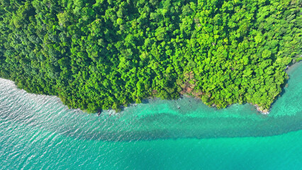 Aerial view unveils the lush rainforests and azure waters that define this island's stunning natural beauty. Travel and adventure concept. Mu Ko Chang National Park, Thailand.
