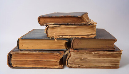 Stack of vintage, worn books against white background. Perfect for education, history, reading...