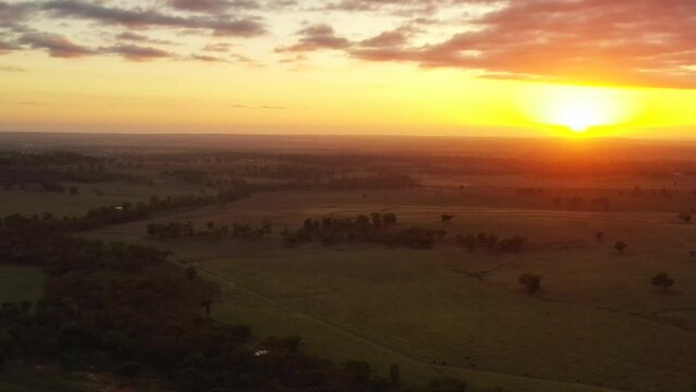 Sunrise over Western plains near Dubbo city of Australia &ndash; aerial landscape 4k.
