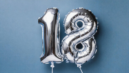 Banner with number 18 silver balloon. 18 years anniversary celebration. Blue background.