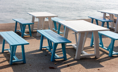 Wooden benches on the seashore