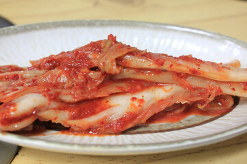 Kimchi is placed in a plate