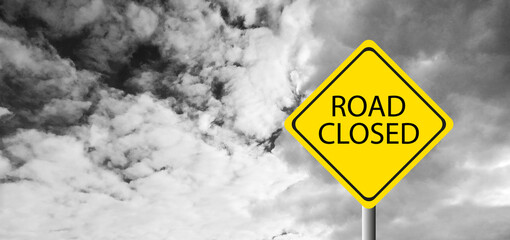 Hurricane Idalia warning sign against a powerful stormy background with copy space. Dirty and angled sign with cyclonic winds add to the drama.hurricane season sign on cloudy background