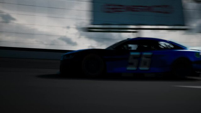TRACKING shot of cars racing on an oval circuit motor speedway racetrack