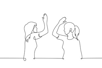 women high five each other - one line art vector. concept female solidarity, girlfriends, high five deal