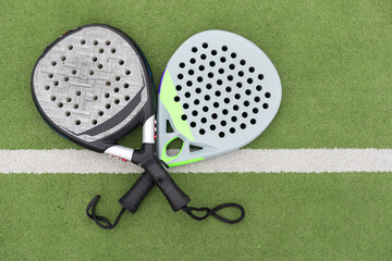 Close up image of paddle tennis rackets