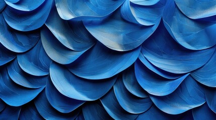 Detailed view of vibrant blue bird feathers forming intricate patterns