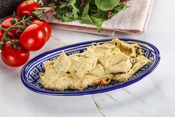 Creamy hummus in the bowl