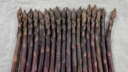 Process frying purple asparagus in electric grill