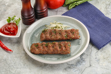 Kebab with beef served onion