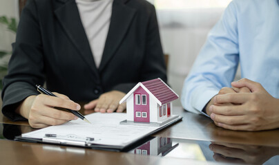 Real estate agents offer sale home insurance and close the sale immediately after the customer...
