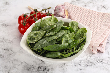 Green spinach leaves in the bowl