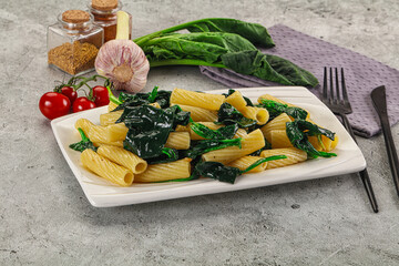 Italian cuisine - tortiglioni with spinach - 794897127