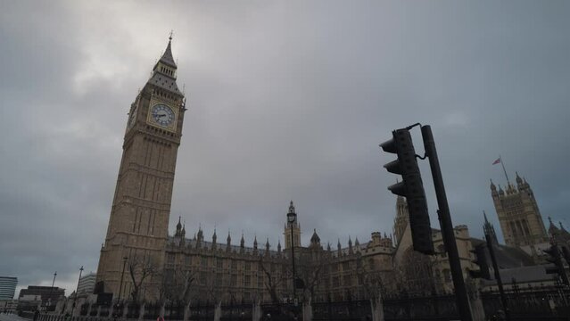 Big Ben Houses of Parliament the Palace of Westminster, and iconic AEC Routemaster red double-decker buses London, United Kingdom