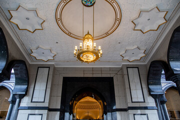 golden chandelier in the interior of Jame' Asr Hassanil Bolkiah Mosque in Brunei Darussalam on...