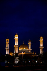 Fototapeta na wymiar Jame' Asr Hassanil Bolkiah Mosque lit up at night in Brunei Darussalam on Borneo in Southeast Asia