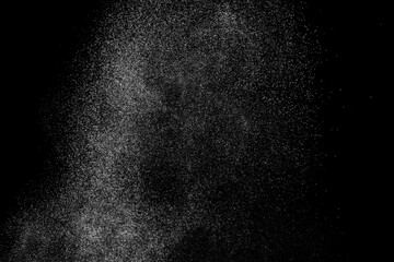 White texture on dark backdrop. Abstract splashes of water on black background. Light clouds...
