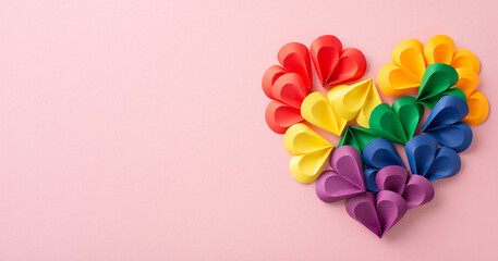 A vibrant display of colorful paper hearts in a rainbow formation, symbolizing love and diversity...