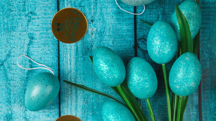 Art Happy Easter concept. Frame of Easter eggs, greeting card and on wooden background. Flat lay, top view, copy space.