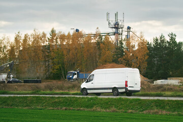 Fast Shipping: Delivery Van of Logistic Company Serving Customers.