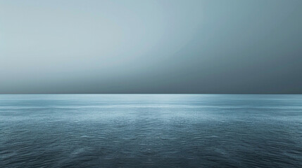 A muted steel blue background, vast and silent.