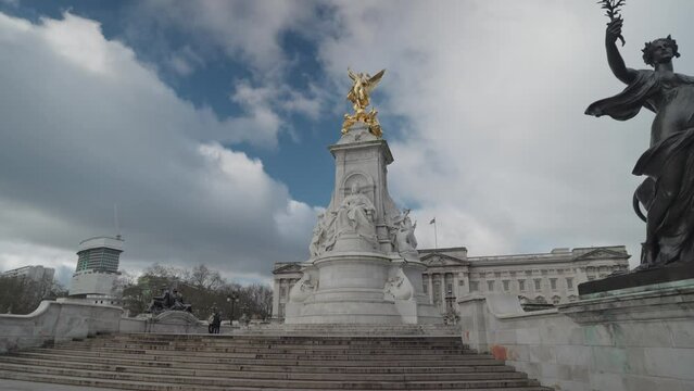 The Victoria Memorial monument to Queen Victoria stands in front of Buckingham Palace London, United Kingdom
