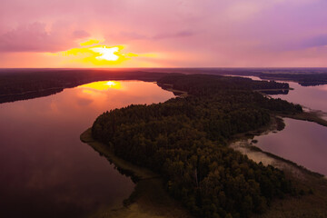Beautiful sunset aerial view of lake Galve, favourite lake among water-based tourists, divers and holiday makers, located in Trakai, Lithuania.