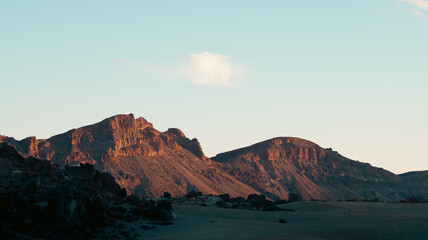 Fototapeta na wymiar Sunset light in the volcano mountain range of the Teide National Park