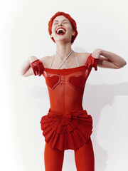 Elegant woman in red dress and gloves posing with arms up in the air