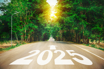 New year 2025 or straight forward concept. Text 2025 written on the road in the middle of asphalt...