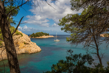 Cala de Sa Ferradura cove near Port de Sant Miquel beach is a paradise for sailing, Sant Joan de Labritja, Ibiza, Balearic Islands, Spain