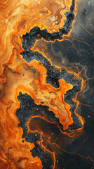 Stunning aerial view of burnt orange and black river patterns