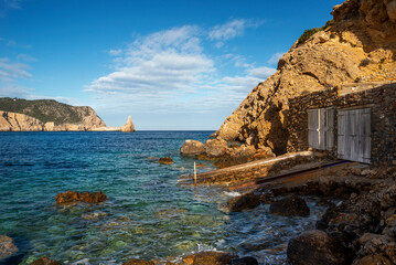 Fishermen huts at Cala Benirras cove, Sant Joan de Labritja, Ibiza, Balearic Islands, Spain