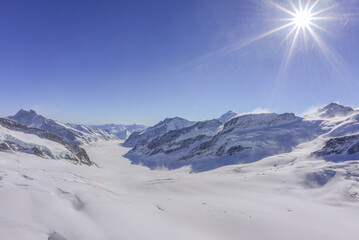 Landscape Views From Jungfrau Mountain Range And View Of The Large Aletsch Glacier Under Clear Sky, Switzerland