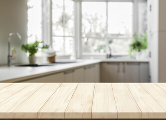 Fototapeta na wymiar Wooden table top with blurred modern kitchen