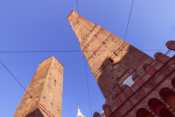 The medieval Two Towers of Bologna, Garisenda and Asinelli, stand as sentinels of time, their...