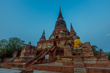 Fototapeta na wymiar background of important religious tourist attractions in Ayutthaya Province of Thailand,Wat Yai Chai Mongkol,has an old Buddha image from the Krungsri period,allowing tourists from all over the world