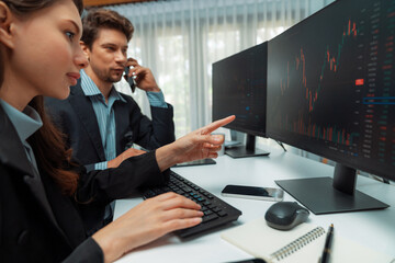 A man broker calling trader businessman to inform high profit point of stock exchange in digital...