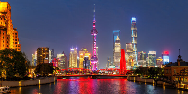 Shanghai skyline at Bund with Oriental Pearl Tower downtown panorama at night in China
