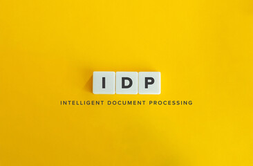 Intelligent Document Processing (IDP). Acronym and Text on Block Letter Tiles on Flat Background. Minimalist Aesthetics.