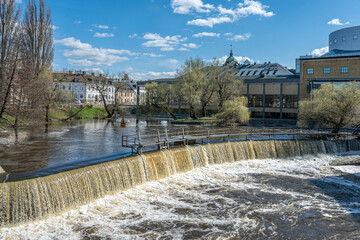 Spring flood in Motala Stream during early spring in Norrköping, Sweden. Norrköping is a historic industrial town. - 795094775
