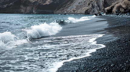 Santorini island Greece. Waves on the Perissa beach 