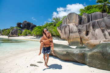 A caucasian couple enjoying life at La Digue Island in the Seychelles Archipelago
