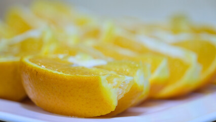 A plate of sliced oranges for a great background use.